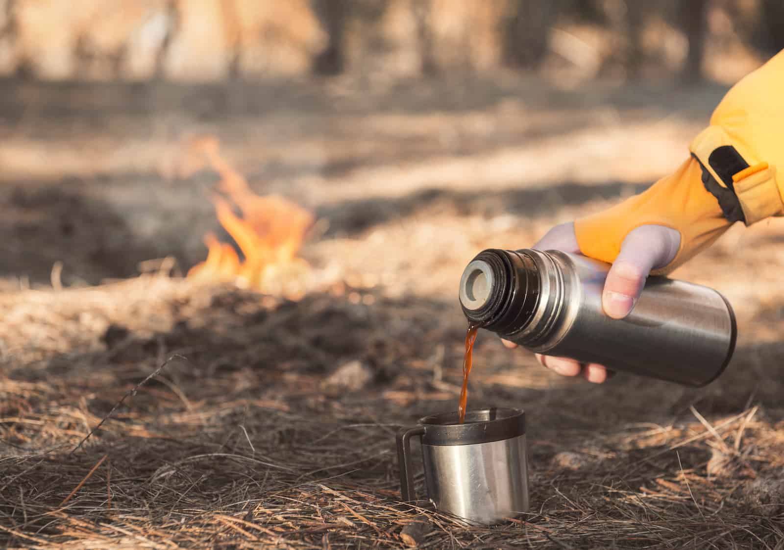 Pouring coffee from thermos